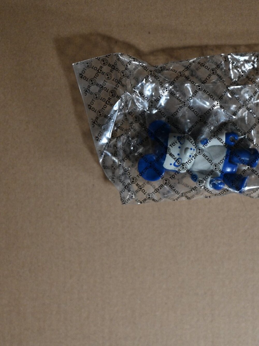 Toy2R Figure White Face Blue Spots Sealed in Toy2R Logo Wrap